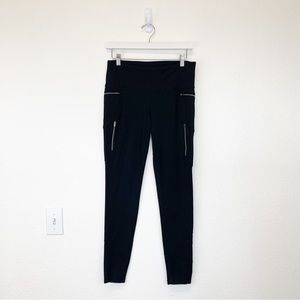 ATHLETA Rainier Unbrushed 7/8 Tight Black w/ Silver Zippers Stash Pockets SIZE M